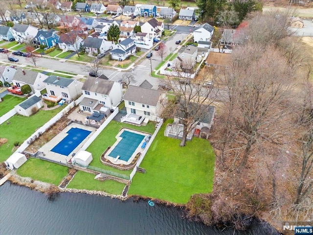aerial view featuring a water view and a residential view