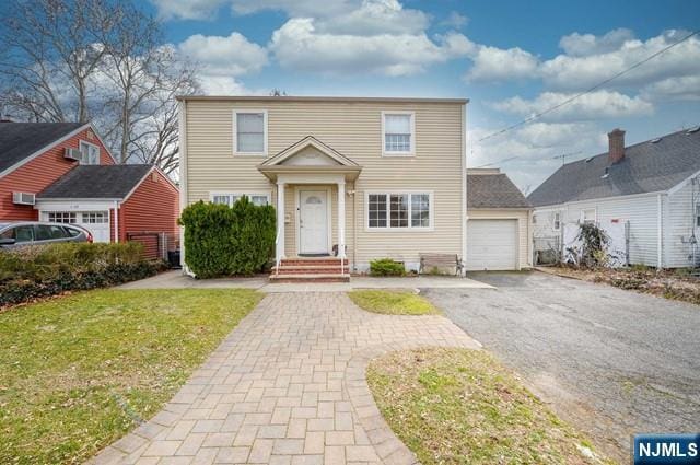 1-06 Lambert Rd, Fair Lawn, NJ 07410 - view of front of property featuring aphalt driveway and a front yard