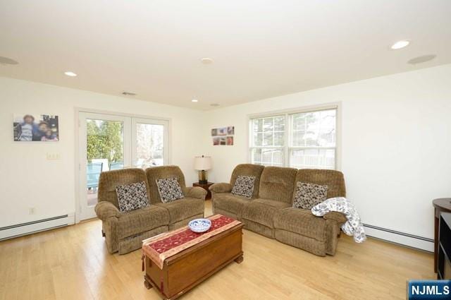 1-06 Lambert Rd, Fair Lawn, NJ 07410 - living area with recessed lighting, baseboard heating, and light wood finished floors