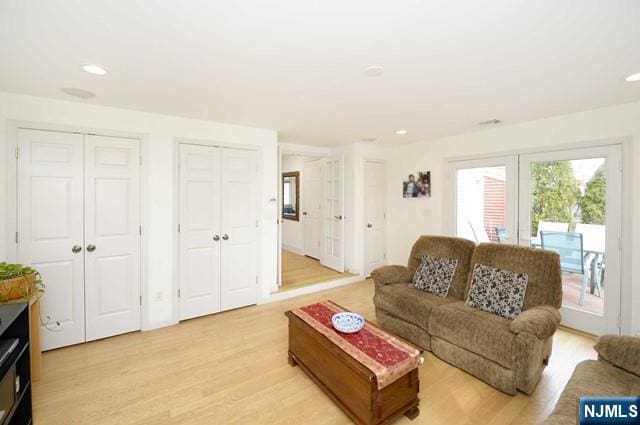 1-06 Lambert Rd, Fair Lawn, NJ 07410 - living area featuring light wood-type flooring and recessed lighting
