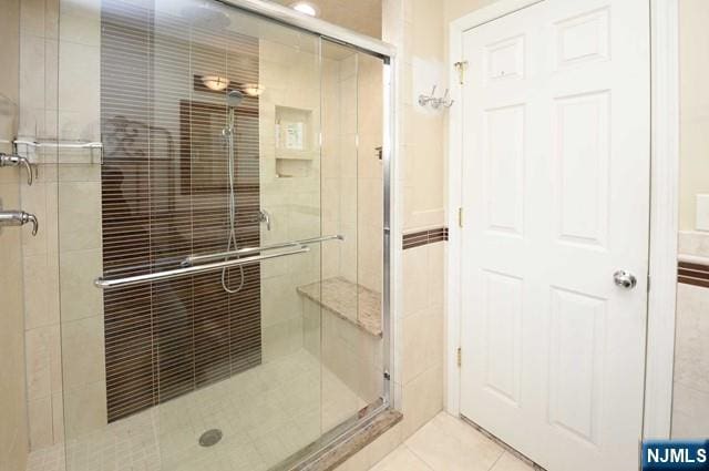 1-06 Lambert Rd, Fair Lawn, NJ 07410 - bathroom with a shower stall and tile patterned flooring