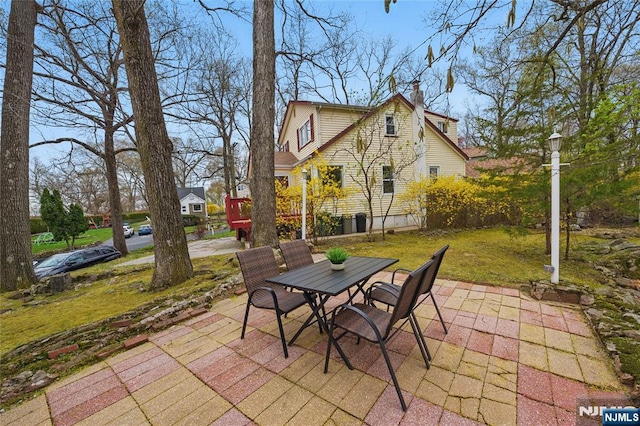 view of patio with outdoor dining space