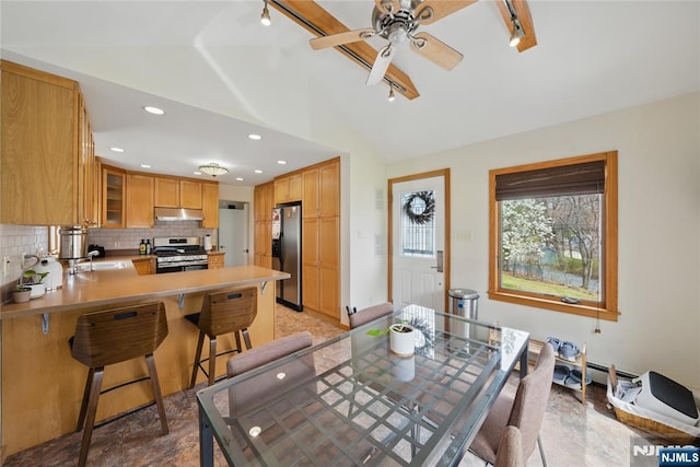 dining area featuring a ceiling fan, recessed lighting, and lofted ceiling