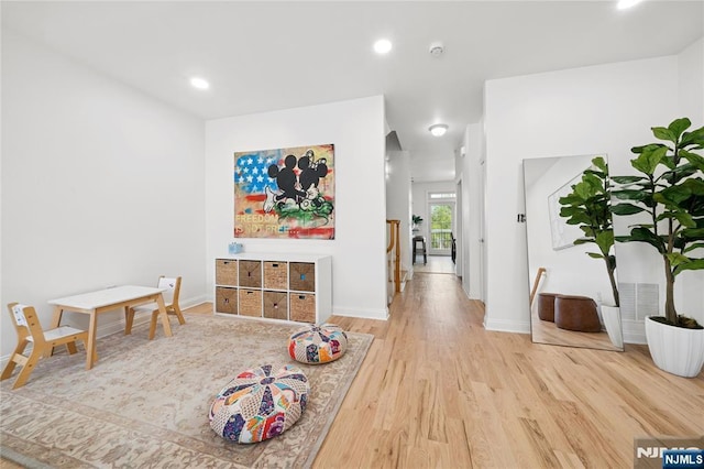 50 Constitution Way Unit 50, Jersey City, NJ 07305 - rec room featuring light wood-style flooring and recessed lighting