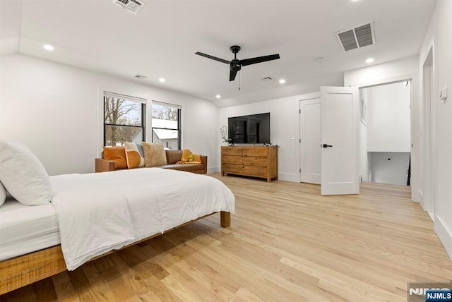bedroom featuring recessed lighting, visible vents, and light wood-style floors