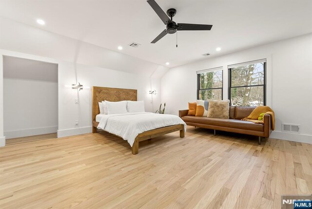 bedroom featuring recessed lighting, baseboards, light wood-type flooring, and visible vents