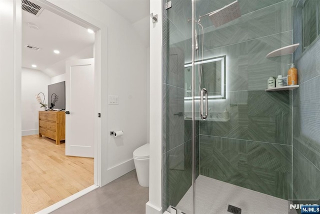 bathroom featuring toilet, recessed lighting, baseboards, a shower stall, and visible vents