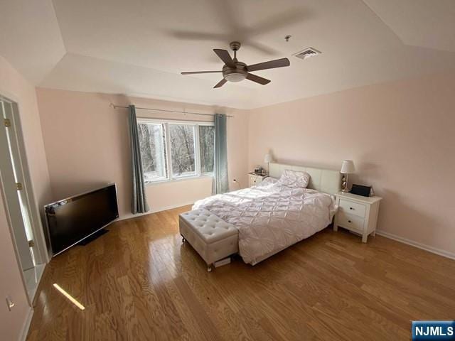 48 Legend Hills Dr, Edgewater, NJ 07020 - bedroom with baseboards, ceiling fan, wood finished floors, and visible vents