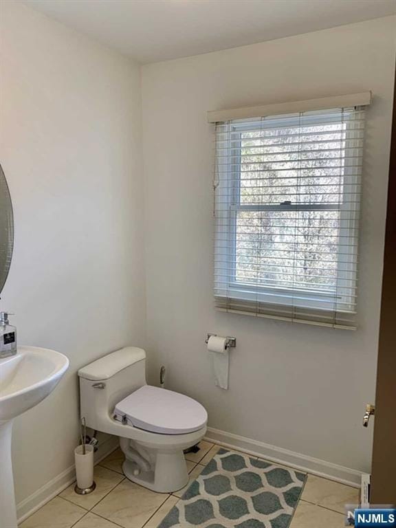 48 Legend Hills Dr, Edgewater, NJ 07020 - half bathroom featuring baseboards, tile patterned floors, and toilet