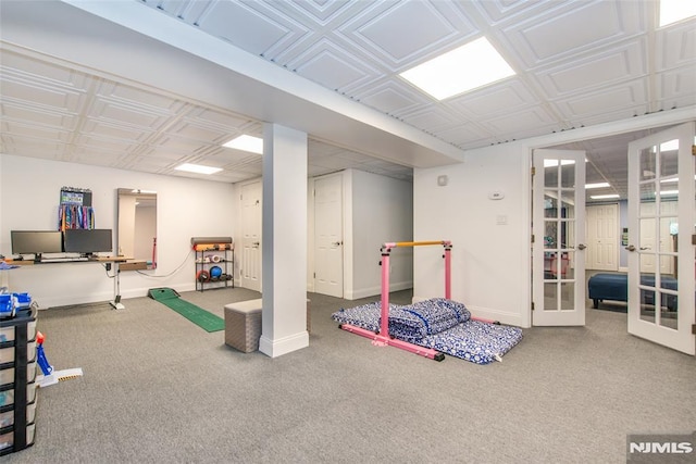 game room with baseboards, french doors, and carpet
