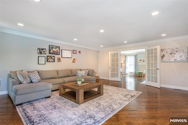 living room with baseboards, ornamental molding, french doors, and recessed lighting