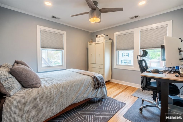bedroom with visible vents, recessed lighting, light wood-style floors, and ornamental molding