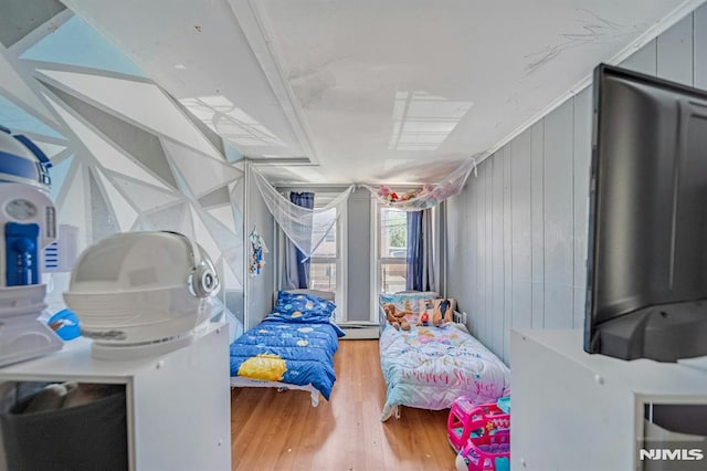 41 Heckel St, Belleville, NJ 07109 - bedroom with a baseboard heating unit and wood finished floors