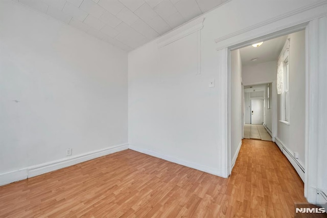 41 Heckel St, Belleville, NJ 07109 - spare room with light wood-type flooring, baseboards, and baseboard heating