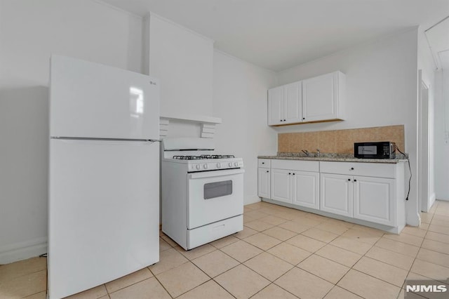 41 Heckel St, Belleville, NJ 07109 - kitchen featuring white appliances, backsplash, white cabinets, and light tile patterned floors