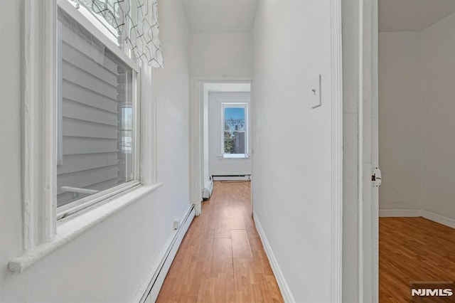 41 Heckel St, Belleville, NJ 07109 - hall featuring baseboards, light wood-style flooring, and a baseboard heating unit