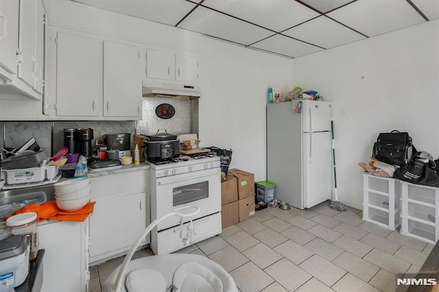 41 Heckel St, Belleville, NJ 07109 - kitchen featuring decorative backsplash, white appliances, light countertops, white cabinetry, and under cabinet range hood