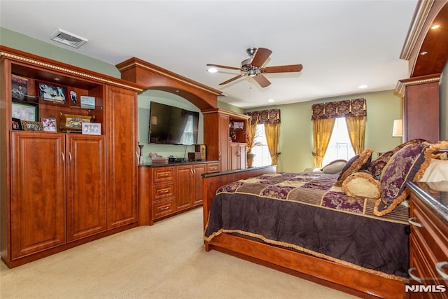 bedroom featuring light carpet, recessed lighting, and visible vents