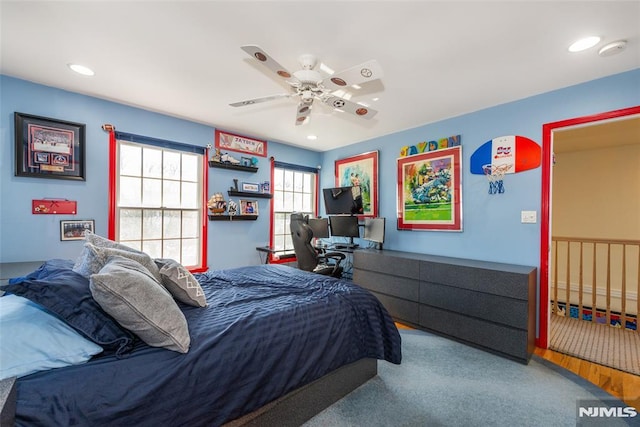 carpeted bedroom featuring a ceiling fan and recessed lighting