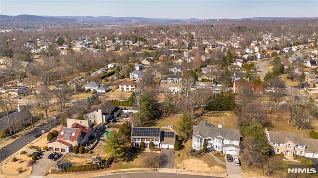 bird's eye view with a residential view and a mountain view