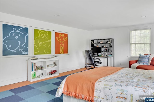bedroom featuring recessed lighting