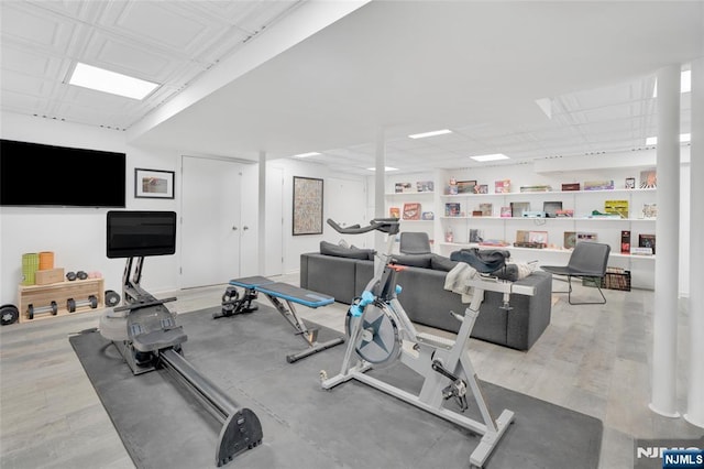 workout room with wood finished floors