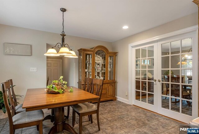dining space featuring french doors, recessed lighting, and baseboards