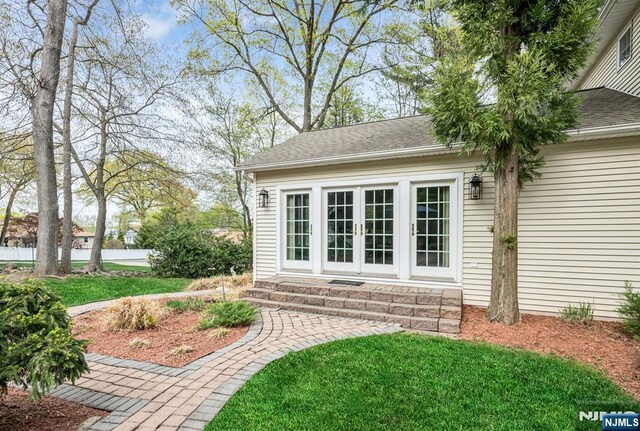 view of yard with french doors