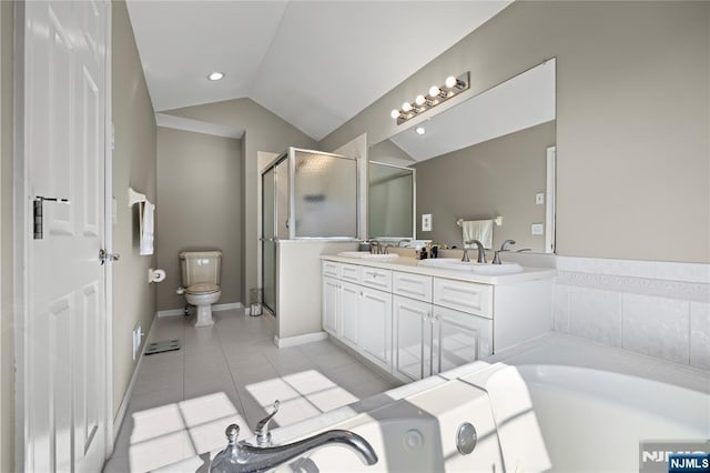 full bath with toilet, tile patterned floors, a bath, a shower stall, and vaulted ceiling