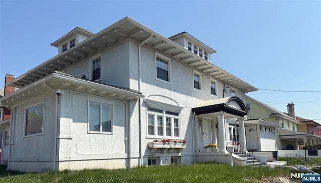 exterior space with stucco siding
