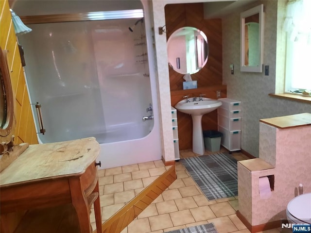 307 Phelps Ave, Bergenfield, NJ 07621 - bathroom featuring a sink, bathing tub / shower combination, toilet, and tile patterned flooring