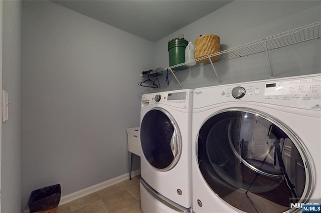16 Marilyn Dr, Woodcliff Lake, NJ 07677 - laundry area with washer and clothes dryer and baseboards