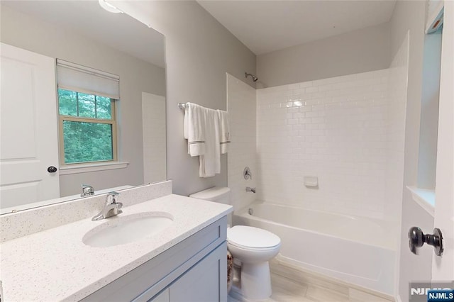 16 Marilyn Dr, Woodcliff Lake, NJ 07677 - bathroom featuring vanity, shower / tub combination, toilet, and wood finished floors
