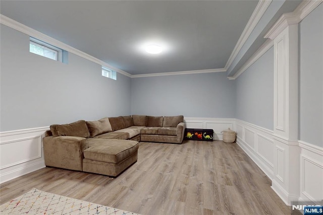 16 Marilyn Dr, Woodcliff Lake, NJ 07677 - living room featuring wood finished floors, a decorative wall, crown molding, and a wainscoted wall