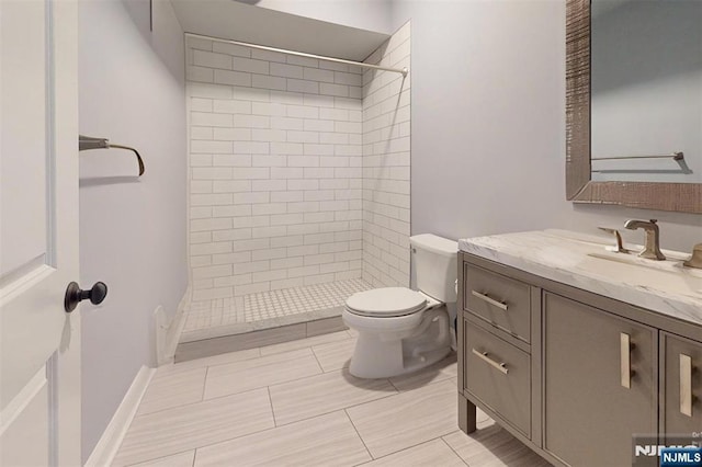 16 Marilyn Dr, Woodcliff Lake, NJ 07677 - full bathroom featuring toilet, vanity, and tiled shower