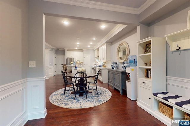 16 Marilyn Dr, Woodcliff Lake, NJ 07677 - dining space featuring crown molding, wainscoting, dark wood-style flooring, a decorative wall, and recessed lighting