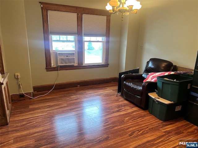 28 Hutchinson Ave, Hawthorne, NJ 07506 - sitting room with a chandelier, cooling unit, dark wood-style floors, and baseboards