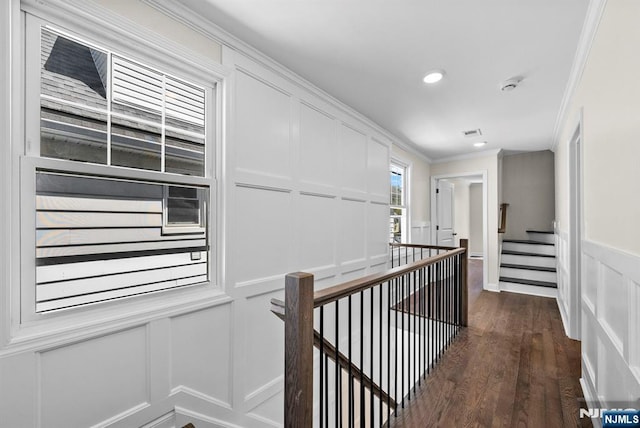 165 Jerome Pl, Bloomfield, NJ 07003 - hall featuring dark wood-style floors, an upstairs landing, ornamental molding, a decorative wall, and recessed lighting