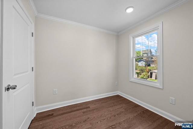 165 Jerome Pl, Bloomfield, NJ 07003 - spare room with baseboards, ornamental molding, and dark wood-type flooring