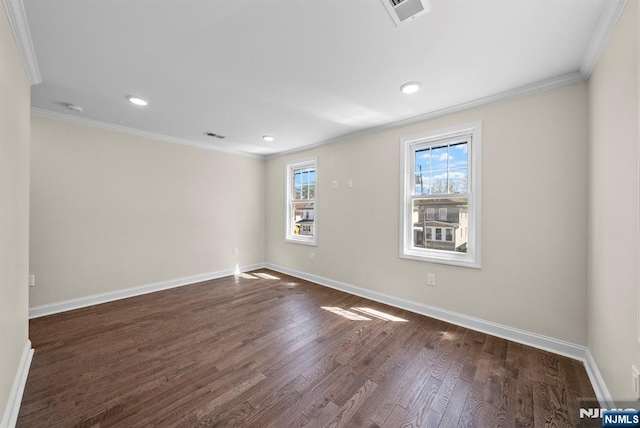 165 Jerome Pl, Bloomfield, NJ 07003 - spare room featuring baseboards, dark wood finished floors, ornamental molding, and a healthy amount of sunlight