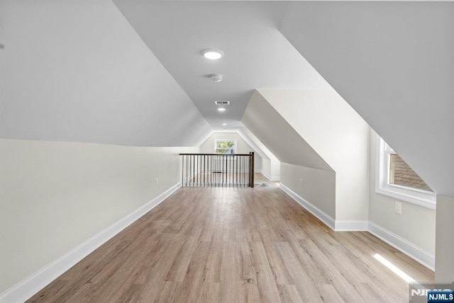 165 Jerome Pl, Bloomfield, NJ 07003 - bonus room featuring baseboards, visible vents, wood finished floors, and lofted ceiling