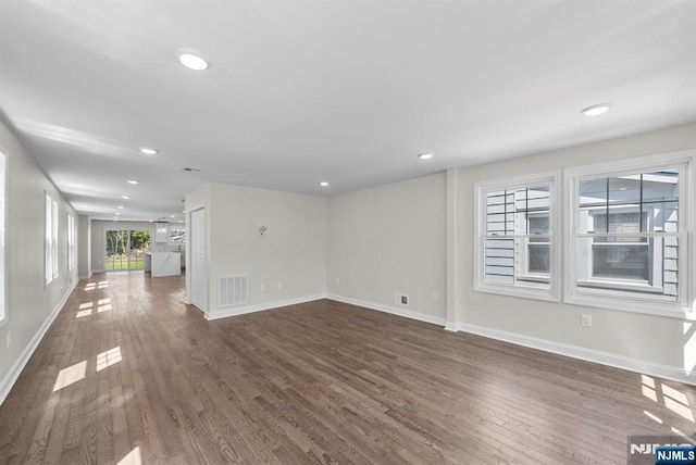 165 Jerome Pl, Bloomfield, NJ 07003 - unfurnished living room with visible vents, recessed lighting, baseboards, and dark wood finished floors