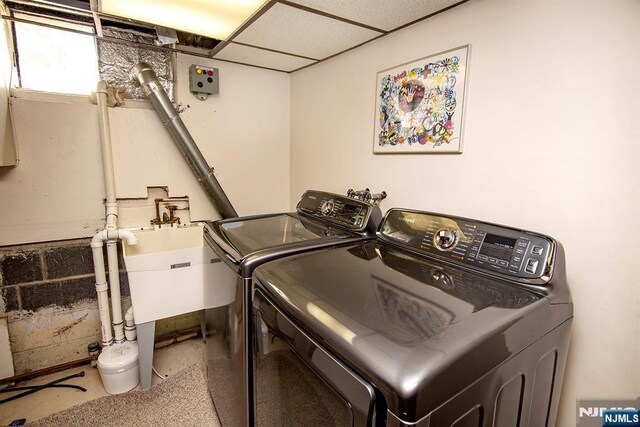 washroom featuring washer and dryer