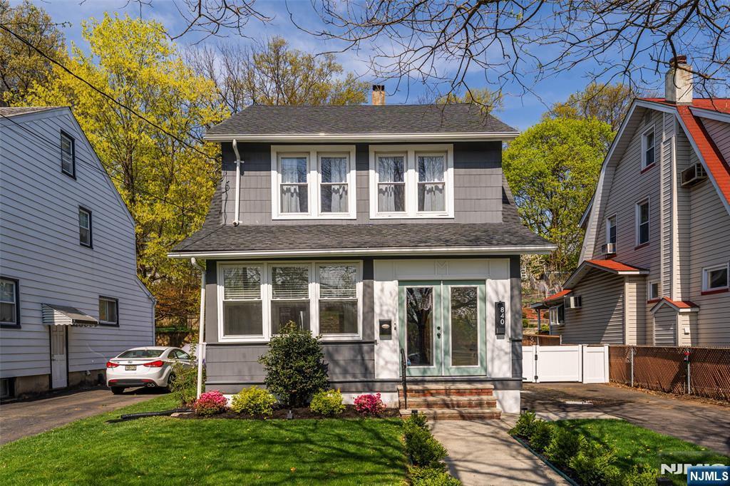840 Broad St, Bloomfield, NJ 07003 - view of front of property with a front lawn, roof with shingles, and fence