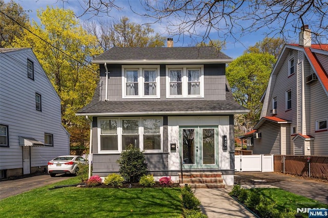 840 Broad St, Bloomfield, NJ 07003 - view of front of property with a front lawn, roof with shingles, and fence