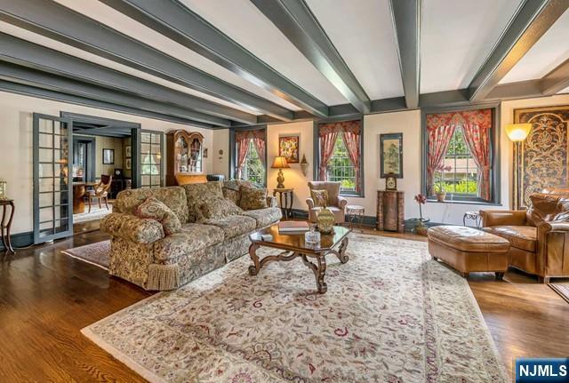 2 Wierimus Ln, Hillsdale, NJ 07642 - living room with baseboards, wood finished floors, a wealth of natural light, and beam ceiling