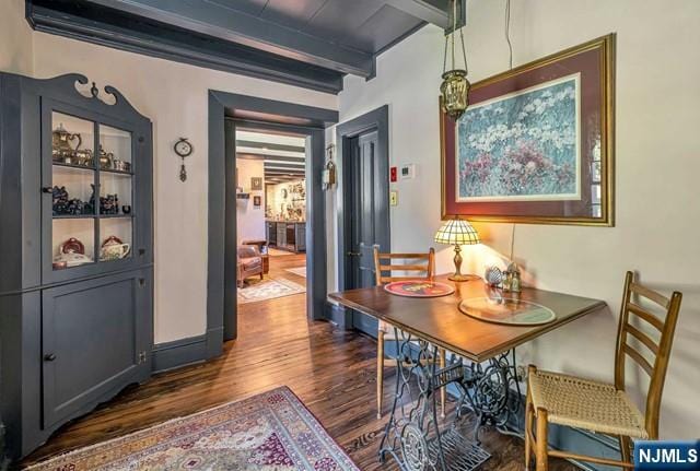 2 Wierimus Ln, Hillsdale, NJ 07642 - dining area with dark wood-type flooring, baseboards, and beamed ceiling