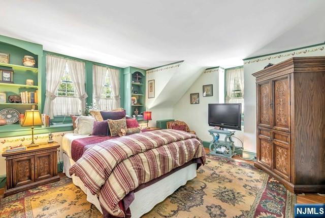 2 Wierimus Ln, Hillsdale, NJ 07642 - bedroom with wood finished floors and lofted ceiling