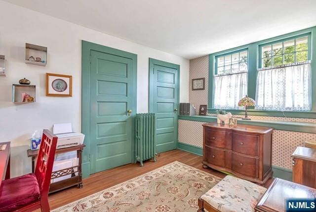 2 Wierimus Ln, Hillsdale, NJ 07642 - interior space featuring radiator, wood finished floors, and wallpapered walls