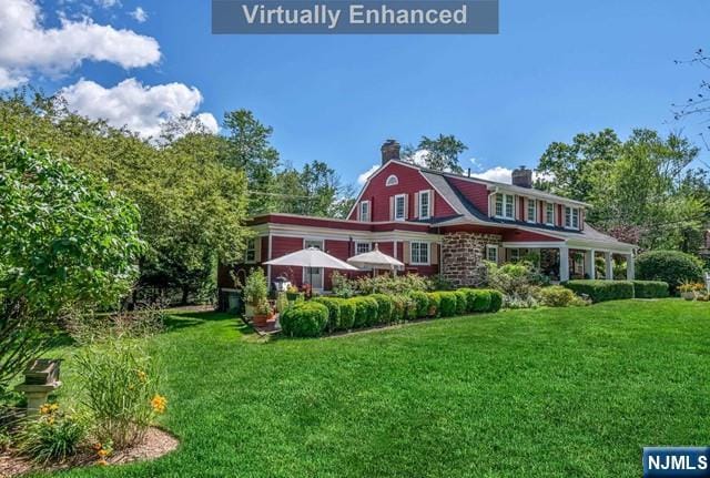 2 Wierimus Ln, Hillsdale, NJ 07642 - view of front of house featuring a chimney and a front lawn